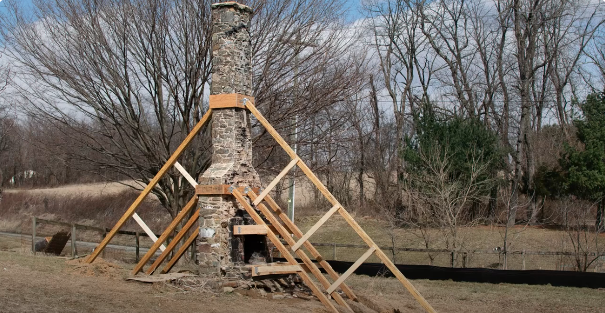 transformation of a home built around an original 1800s log cabin fireplace