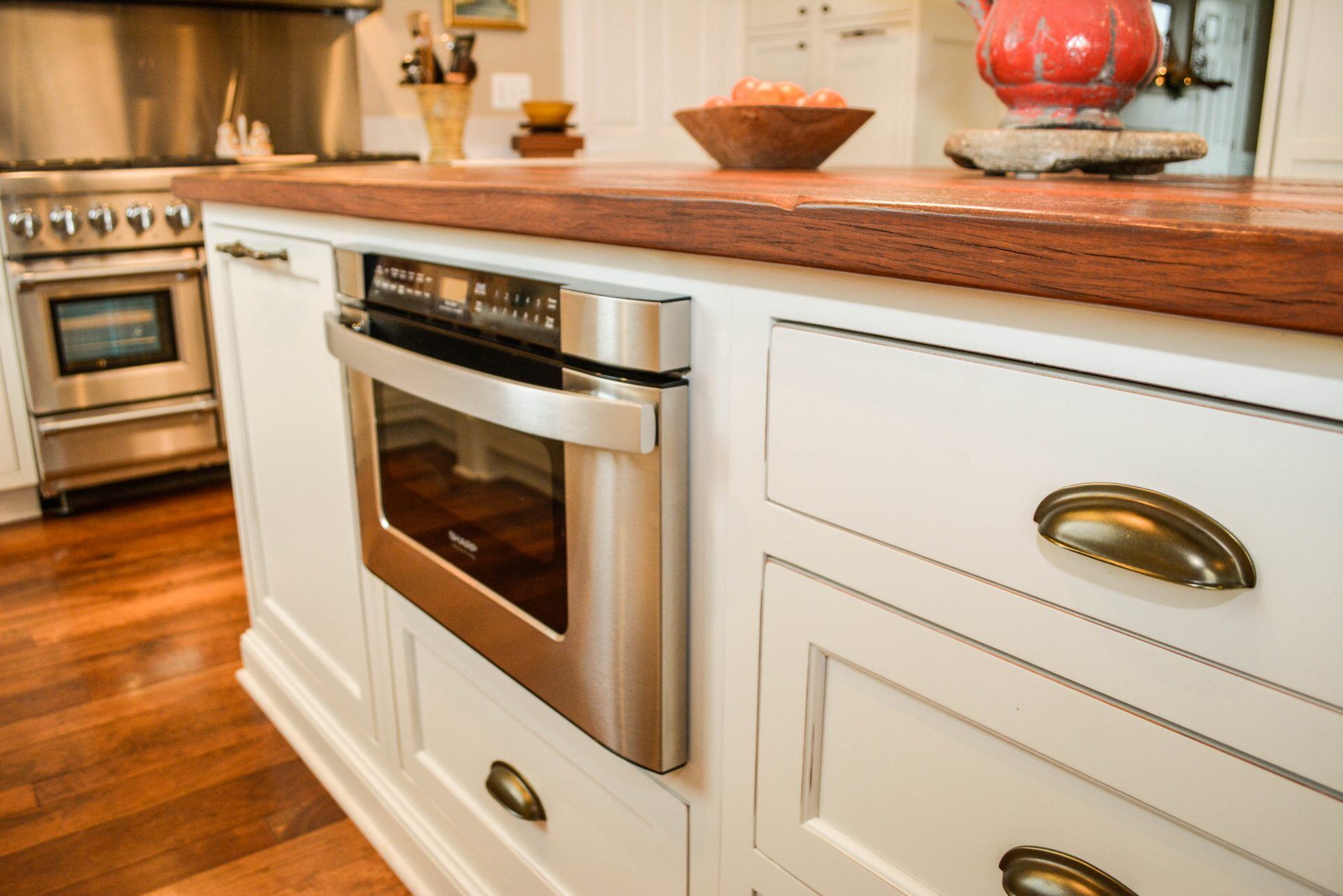 Custom built reclaimed wood countertop and cabinetry